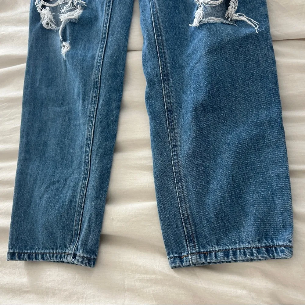 Medium wash distressed jeans - Image 9