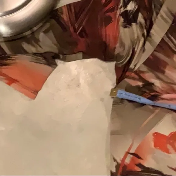 One-piece shirt with a scoop neck and halter. - Image 5