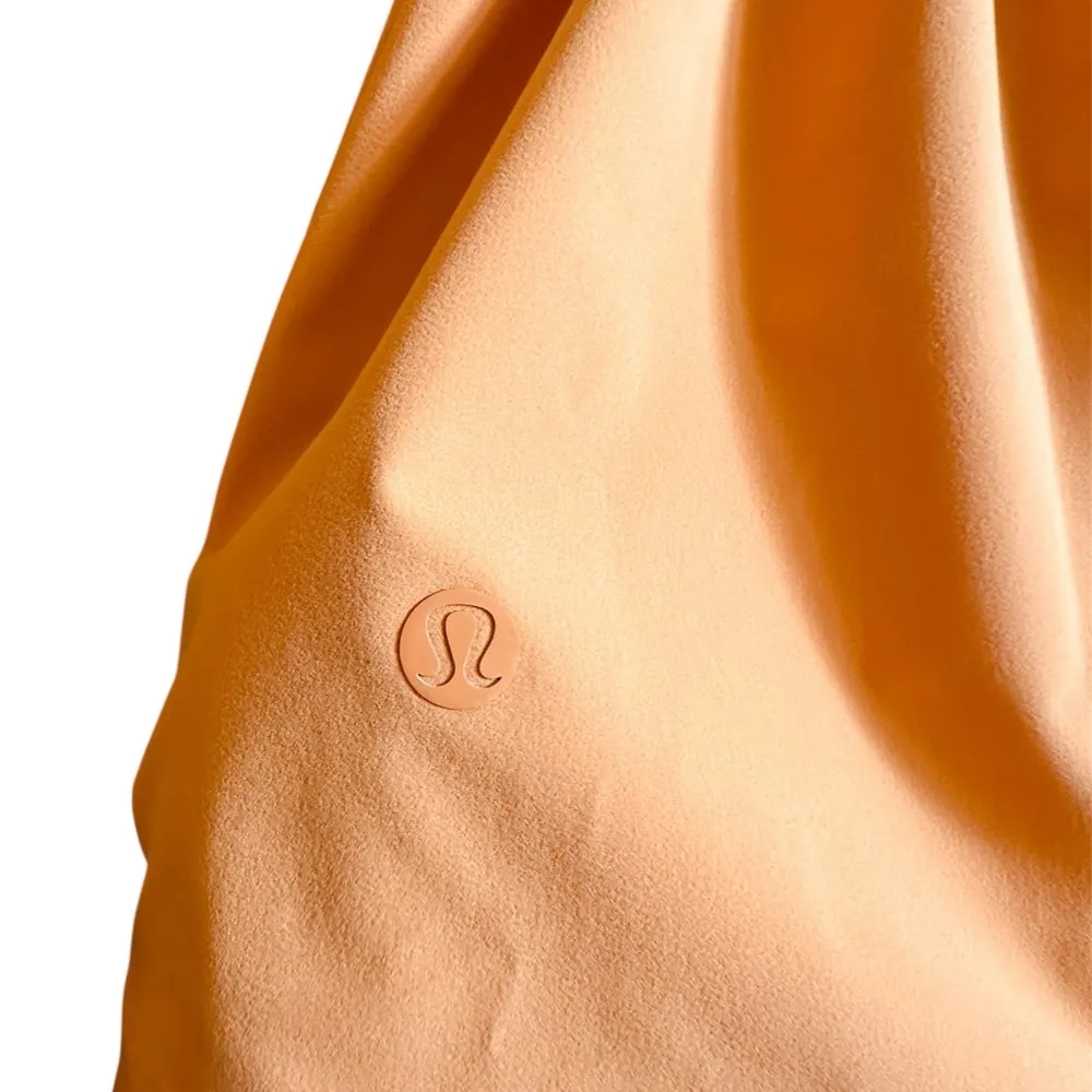 Lululemon Athletica Orange Raincoat with Hood and Water-Resistant Fabric - Image 6