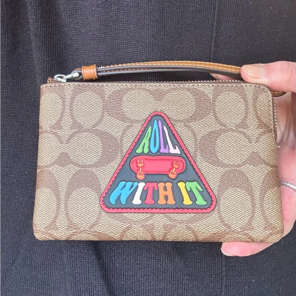 Authentic COACH Signature coated canvas/leather "Roll with it" zip wristlet - Image 2