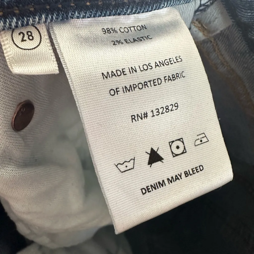 GRLFND PIPER Classic Blue Women's Jeans with distressing at the knee. - Image 6