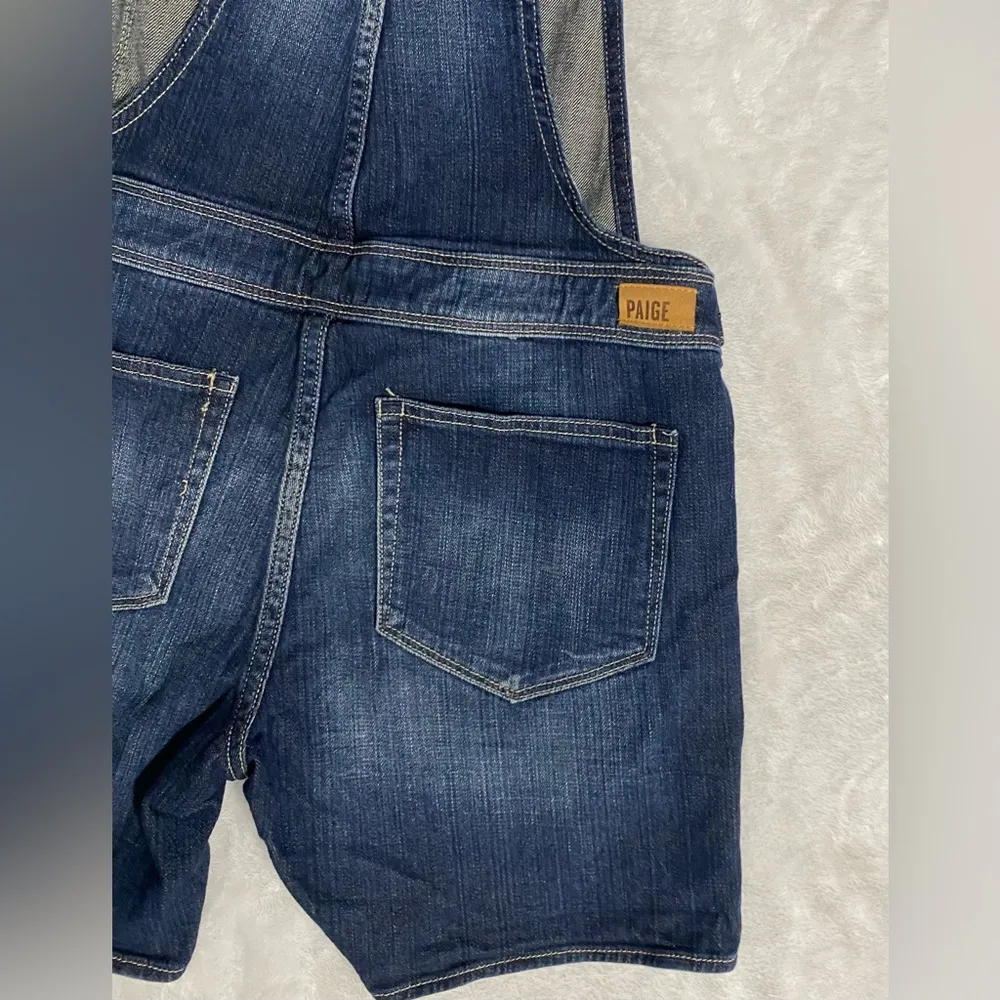 denim short overalls.These overalls are dark wash. - Image 4
