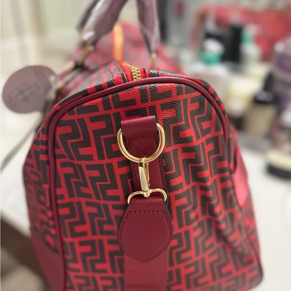 Luxie Red and Black Geometric Travel Bag with Leather Accents - Image 4