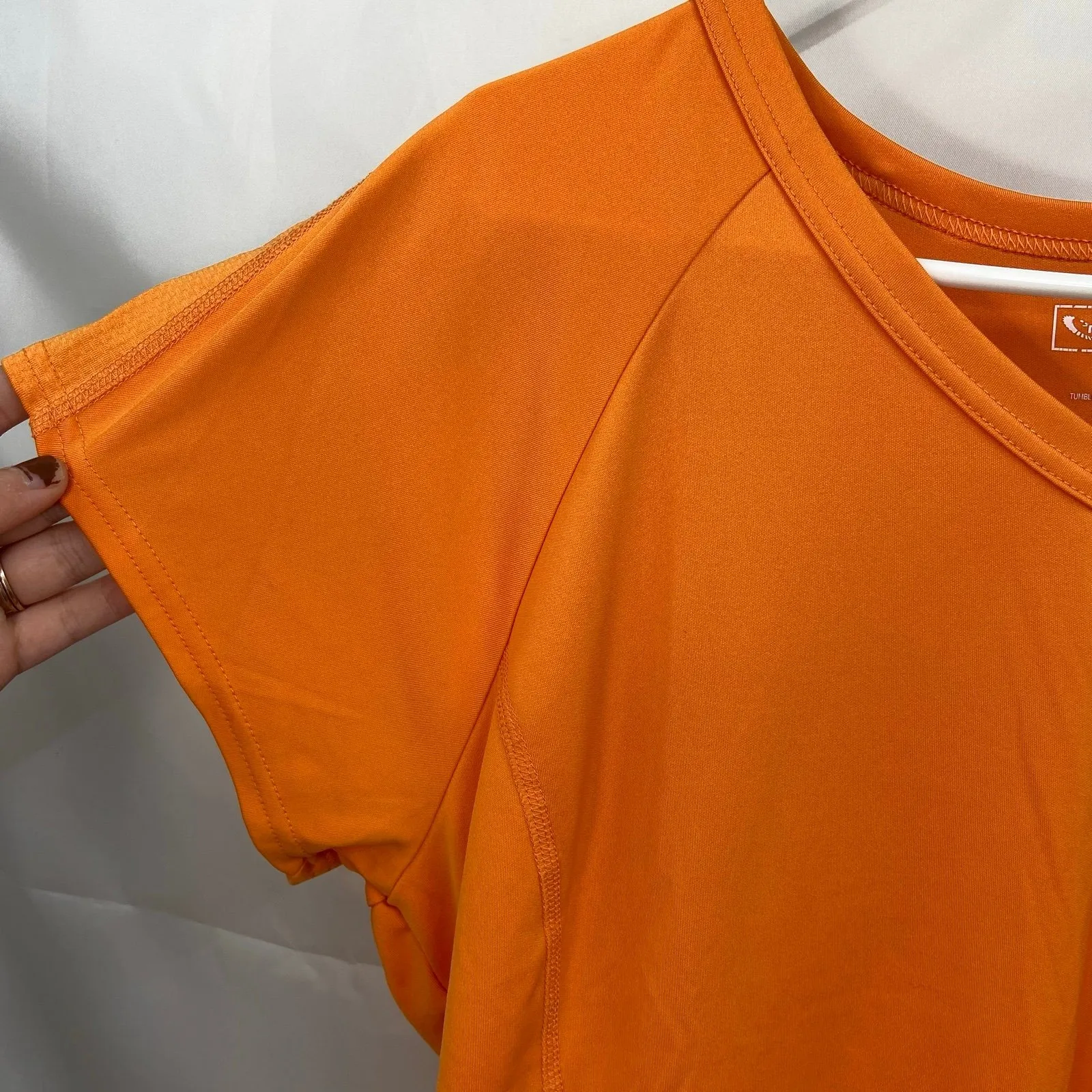 Tek Gear women's orange v-neck short sleeve stretch pocket active athletic shirt - Image 2