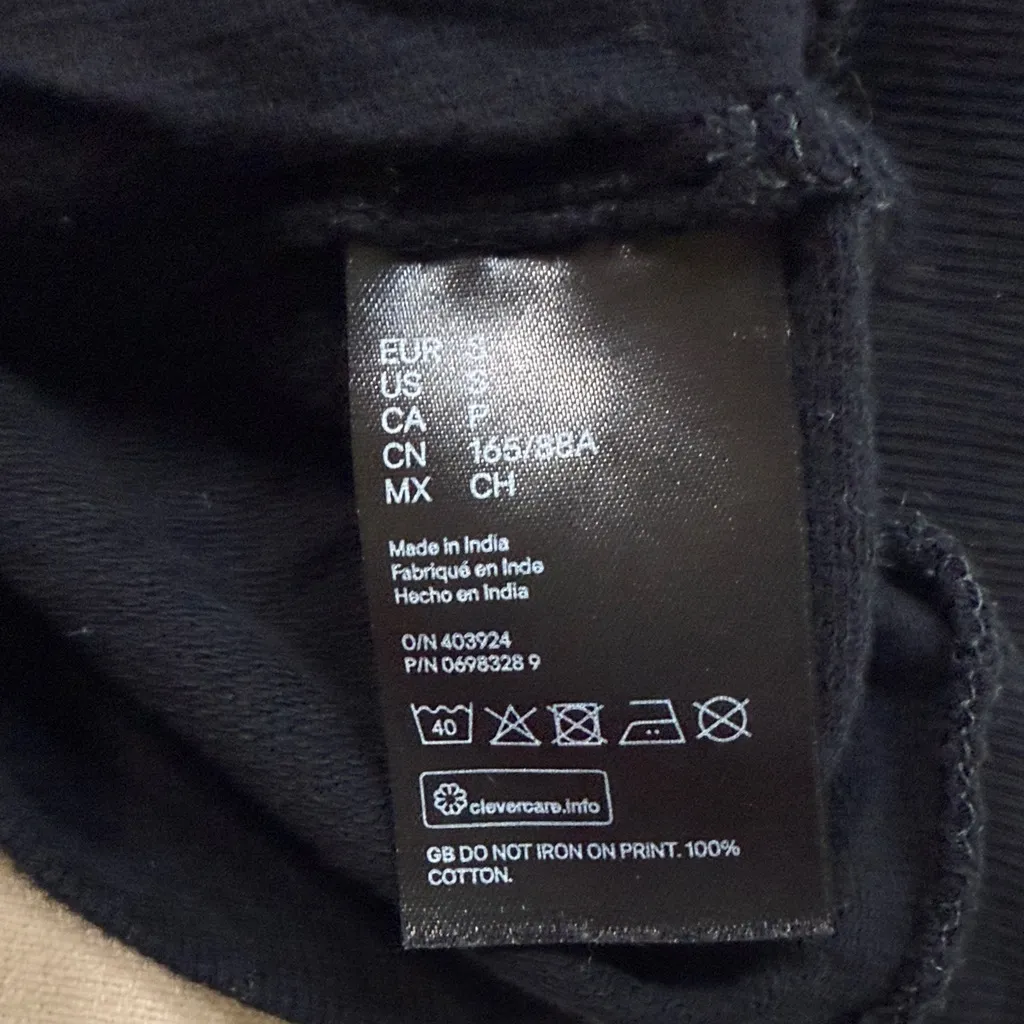 Divided Black Crewneck Sweater with White Accents - Image 6