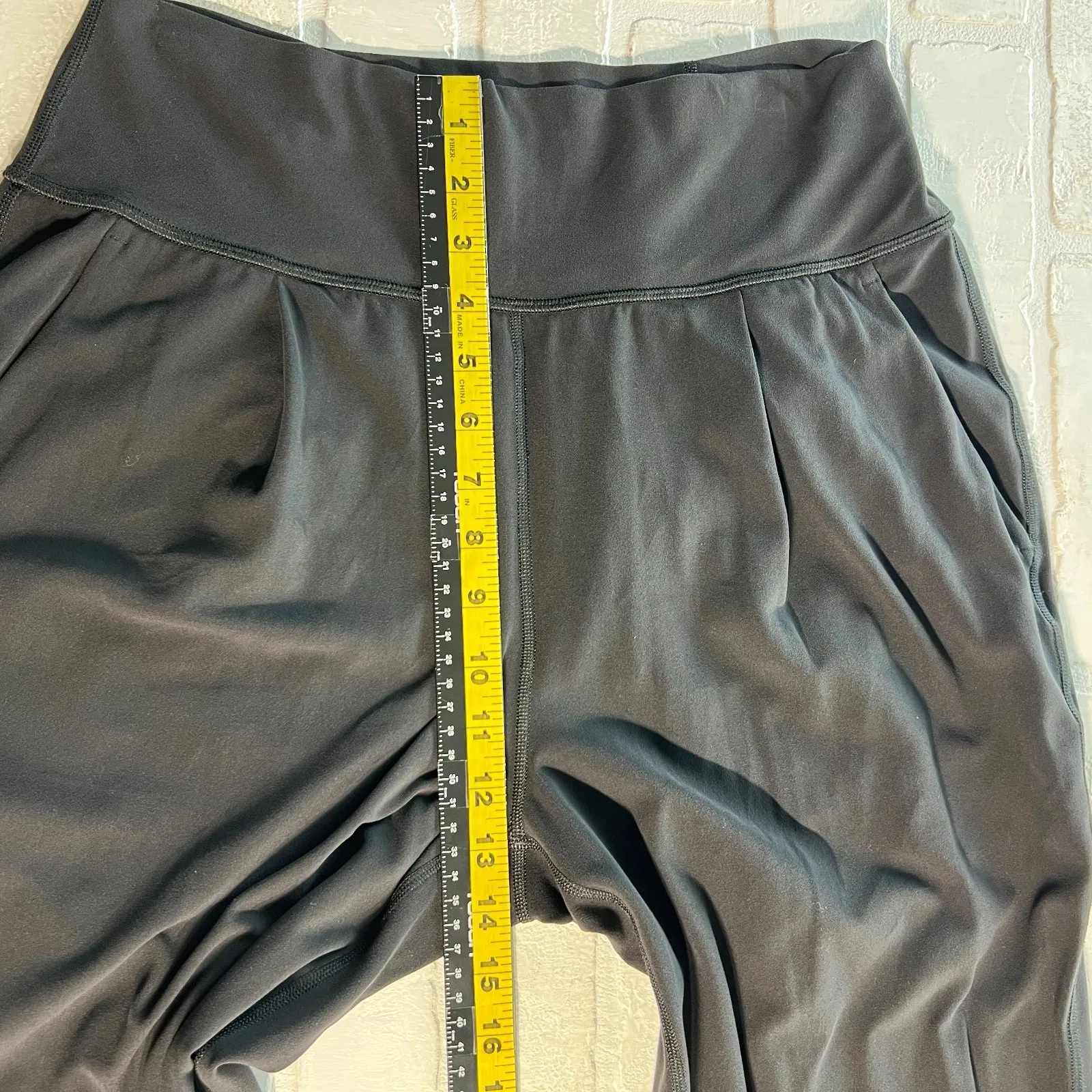 Athleta Elation Pants Women Medium Black Tapered Pleated Stretch Knit Athleisure - Image 4