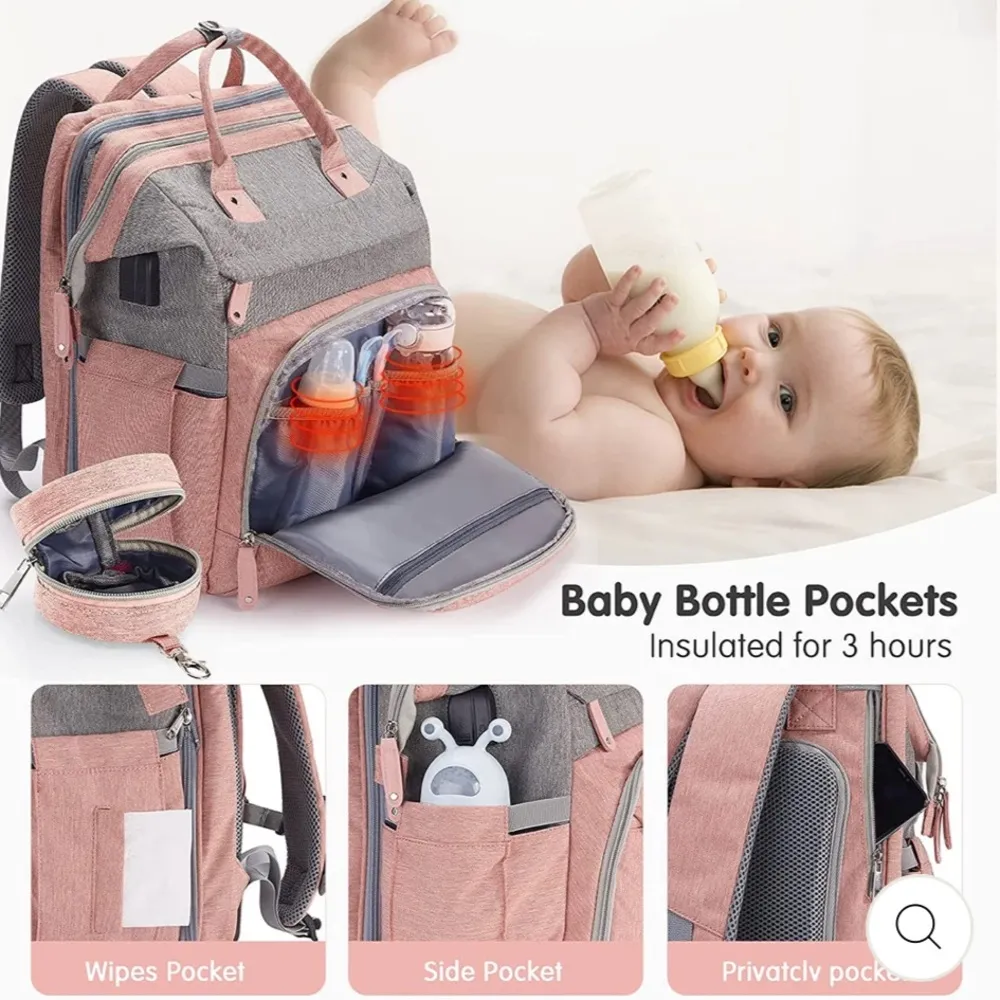 MULTI Compartment diaper bag with changing pad, USB & foldable crib Pink - Image 12