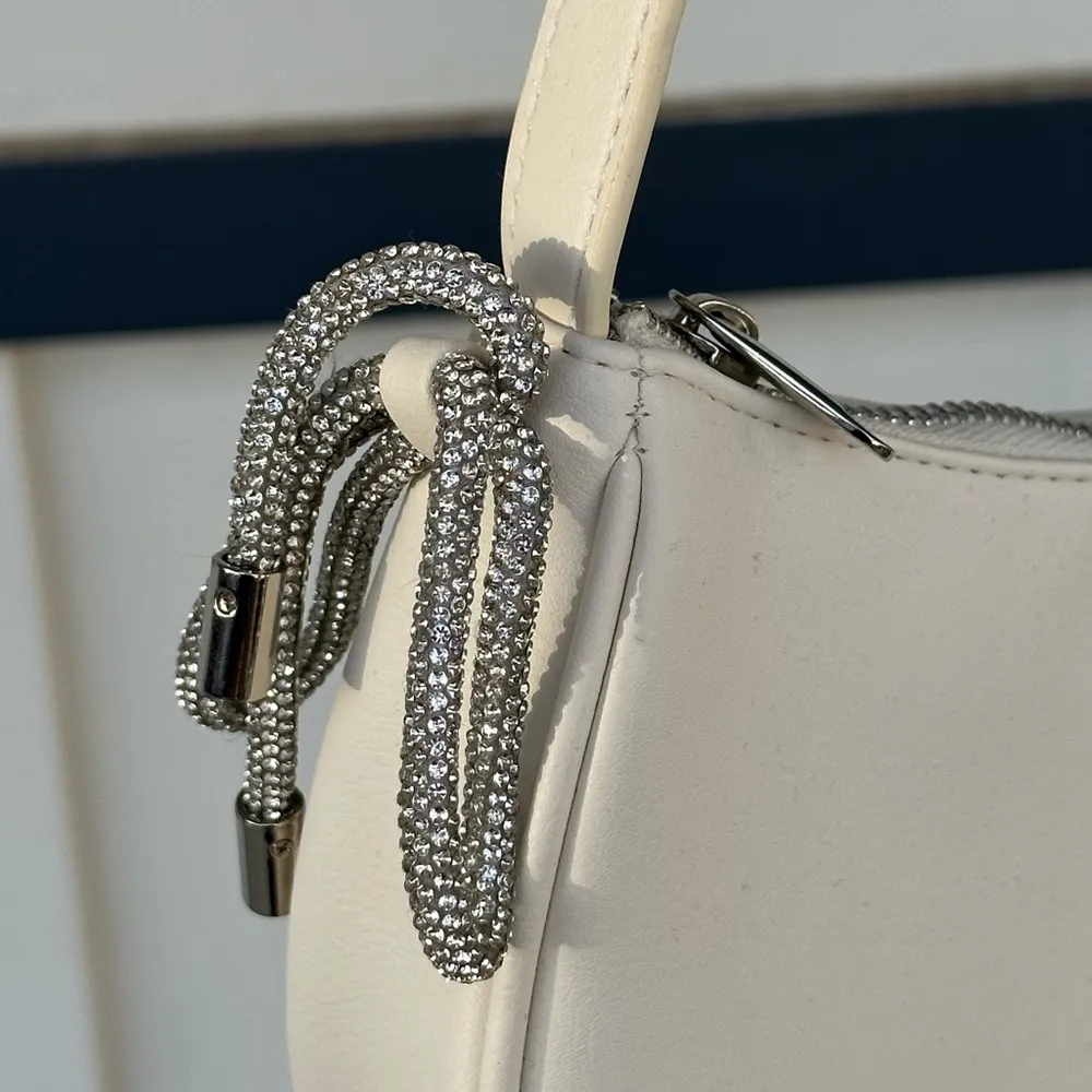 Like new Wild fable white cream purse with silver bows - Image 2