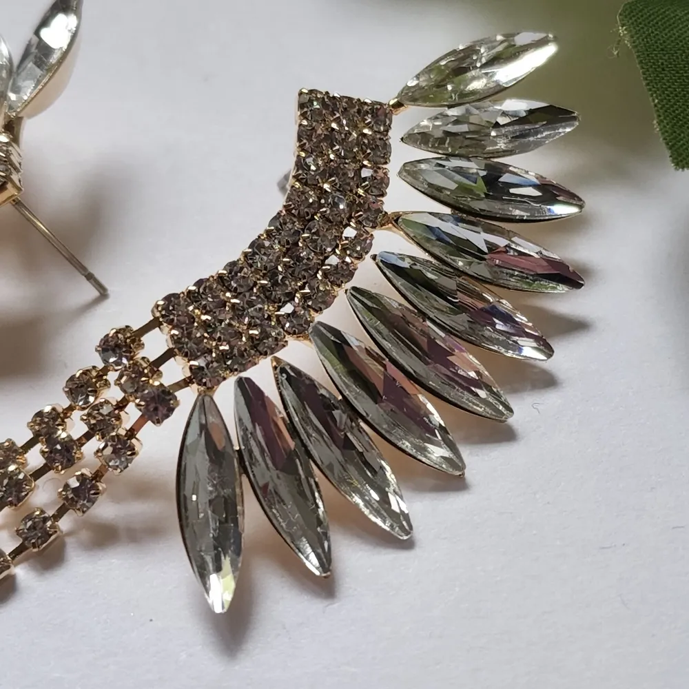 Gold and Crystal Wing Fan Tassel Dangle Earrings - Image 4