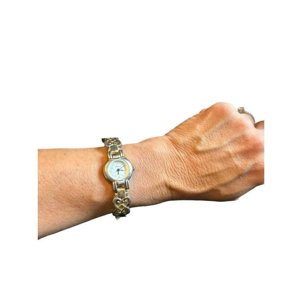 Vintage Geneva Women's Gold Watch With Intricate Band - Image 10