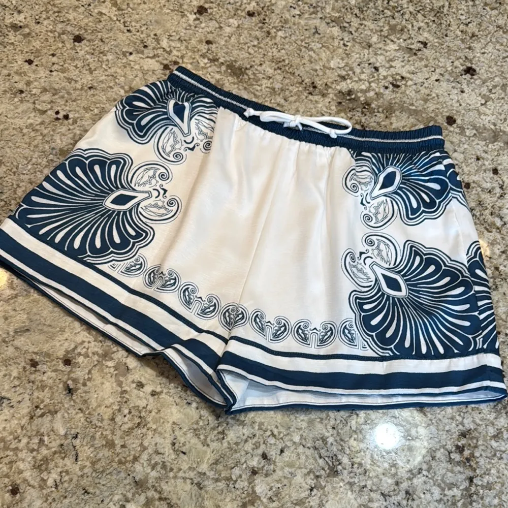 Luxxel Blue and White Shorts with Bold Pattern - Image 3