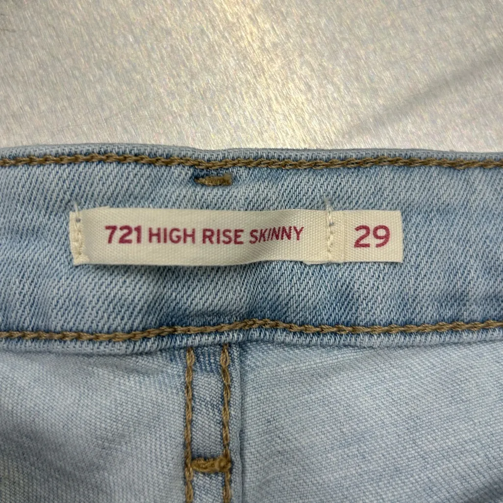 Levi’s embellished high rise light blue skinny jeans w/ distressed hem - Image 4