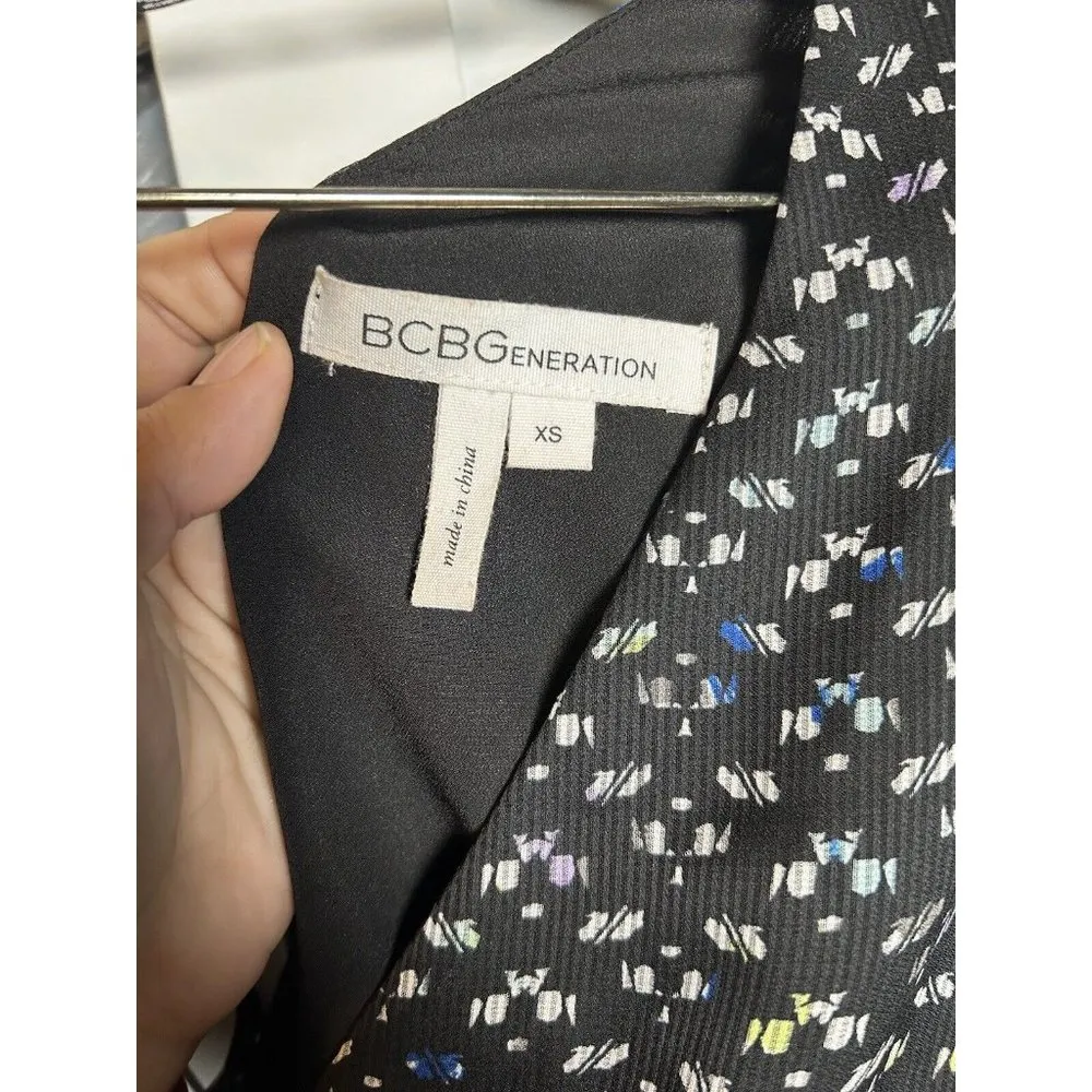 Womens romper‎ size xsmall bcbgeneration black with small geometric design - Image 5