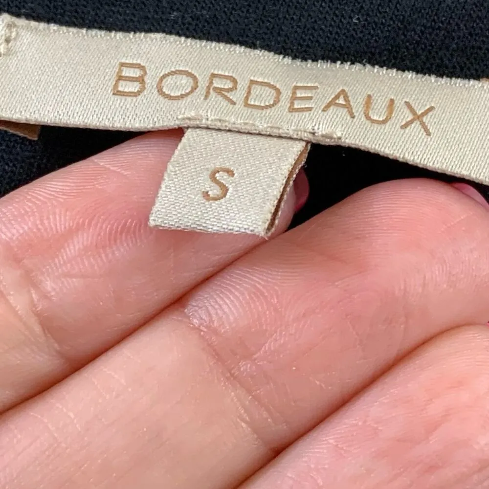 Bordeaux Jersey Knit Ruched Faux Wrap Black Dress - Image 2