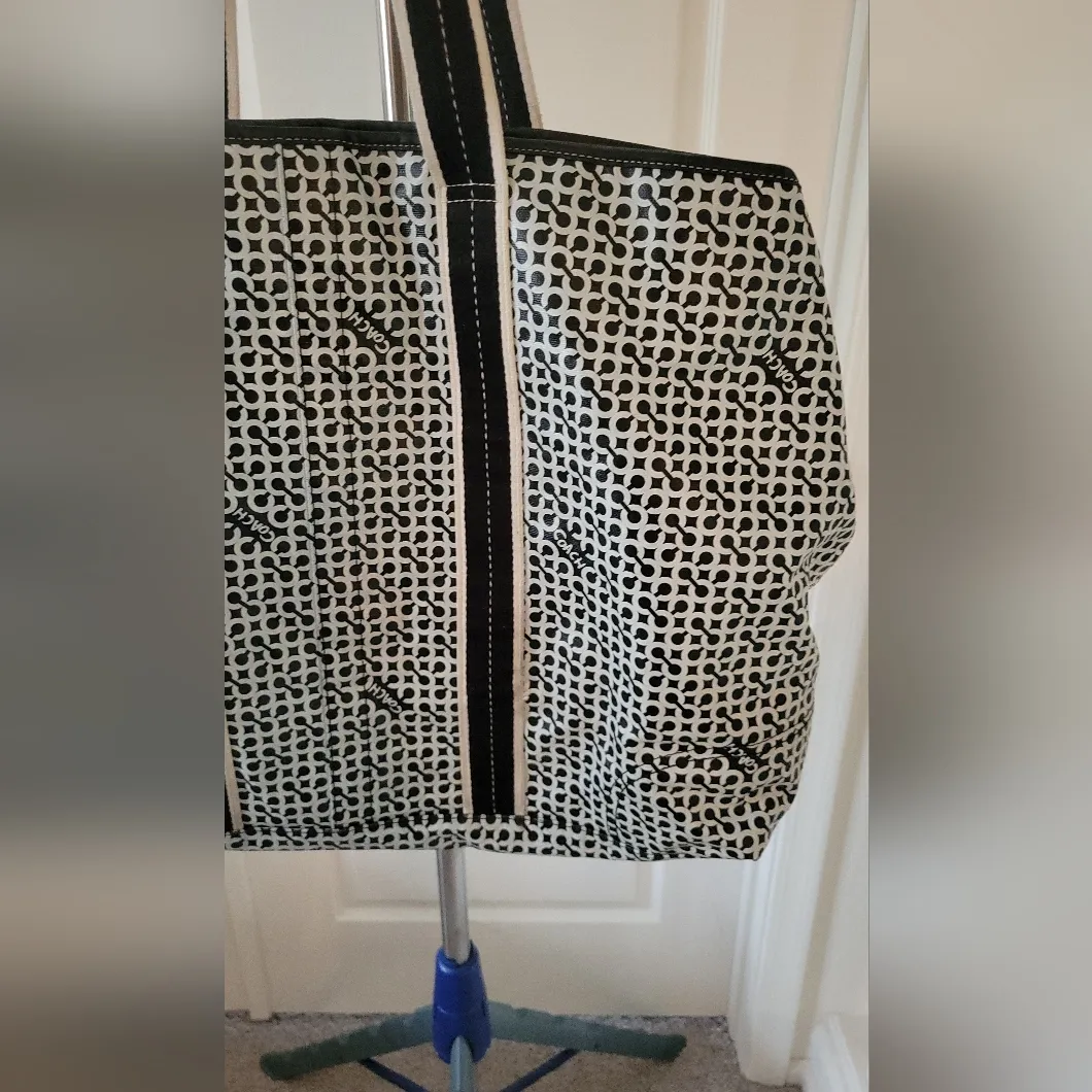 Coach Penelope Op Art Signature PVC Weekender Carry-On Tote in black and white. - Image 11