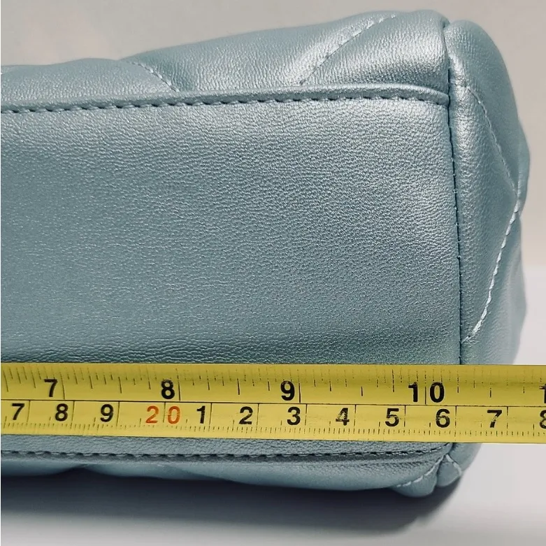 Light and ethereal quilted convertible crossbody rests like a dream on your arm - Image 12