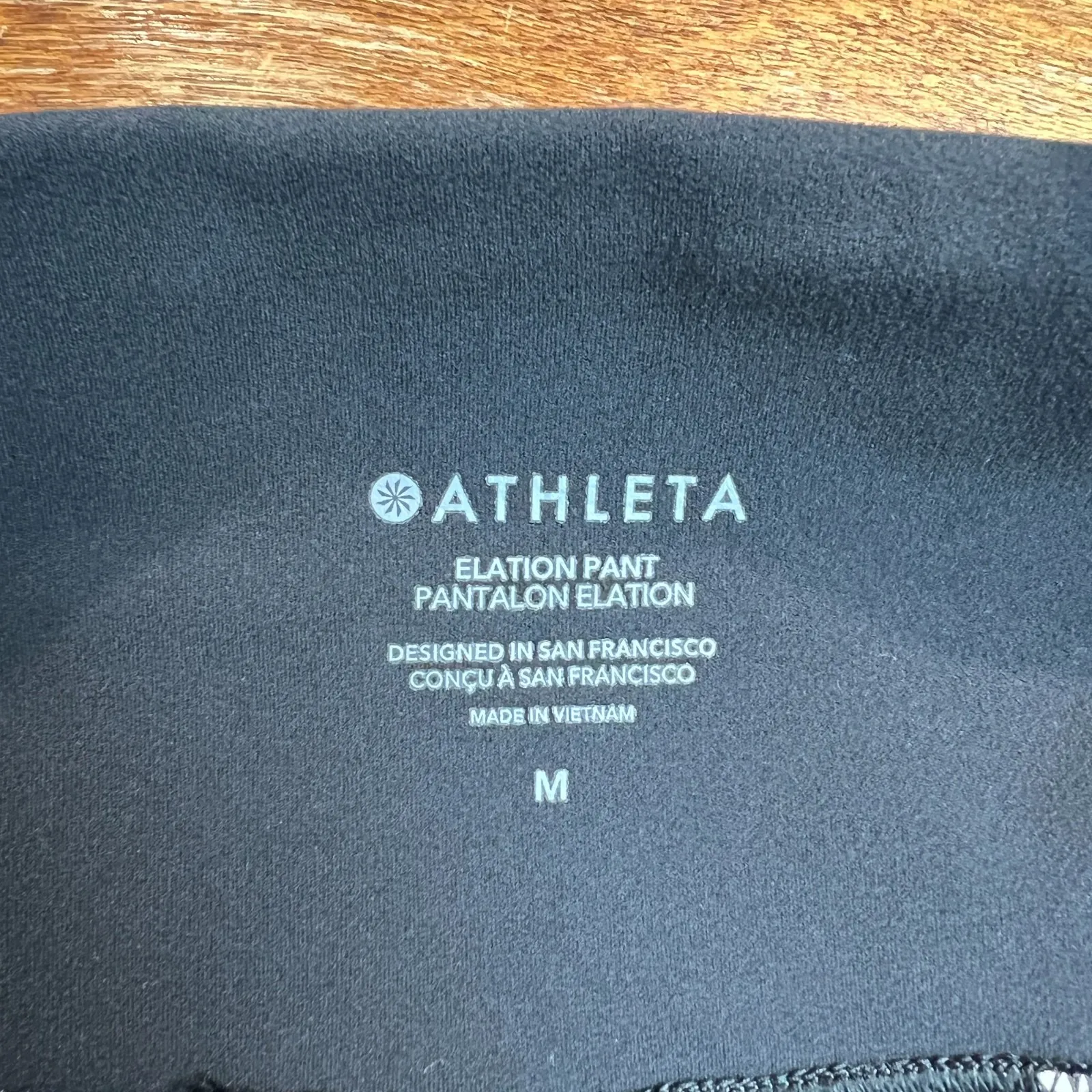 Athleta Elation Pants Women Medium Black Tapered Pleated Stretch Knit Athleisure - Image 9