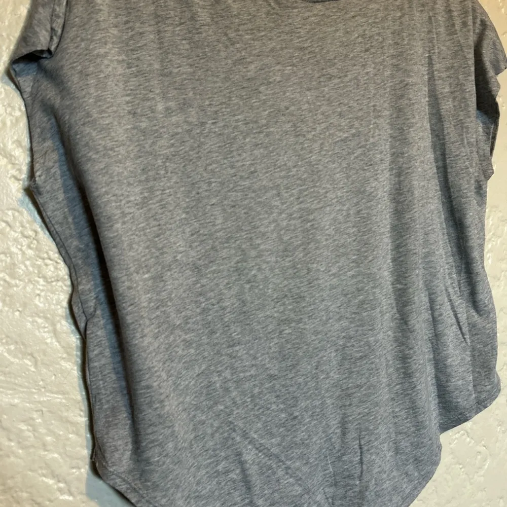 Nike women’s oversized loose fit cutoff sleeveless round hem shirt size medium - Image 9