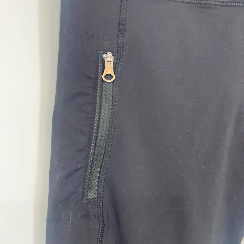 Lululemon Black Leggings with Zipper Pockets sheer net Size 4 - Image 2