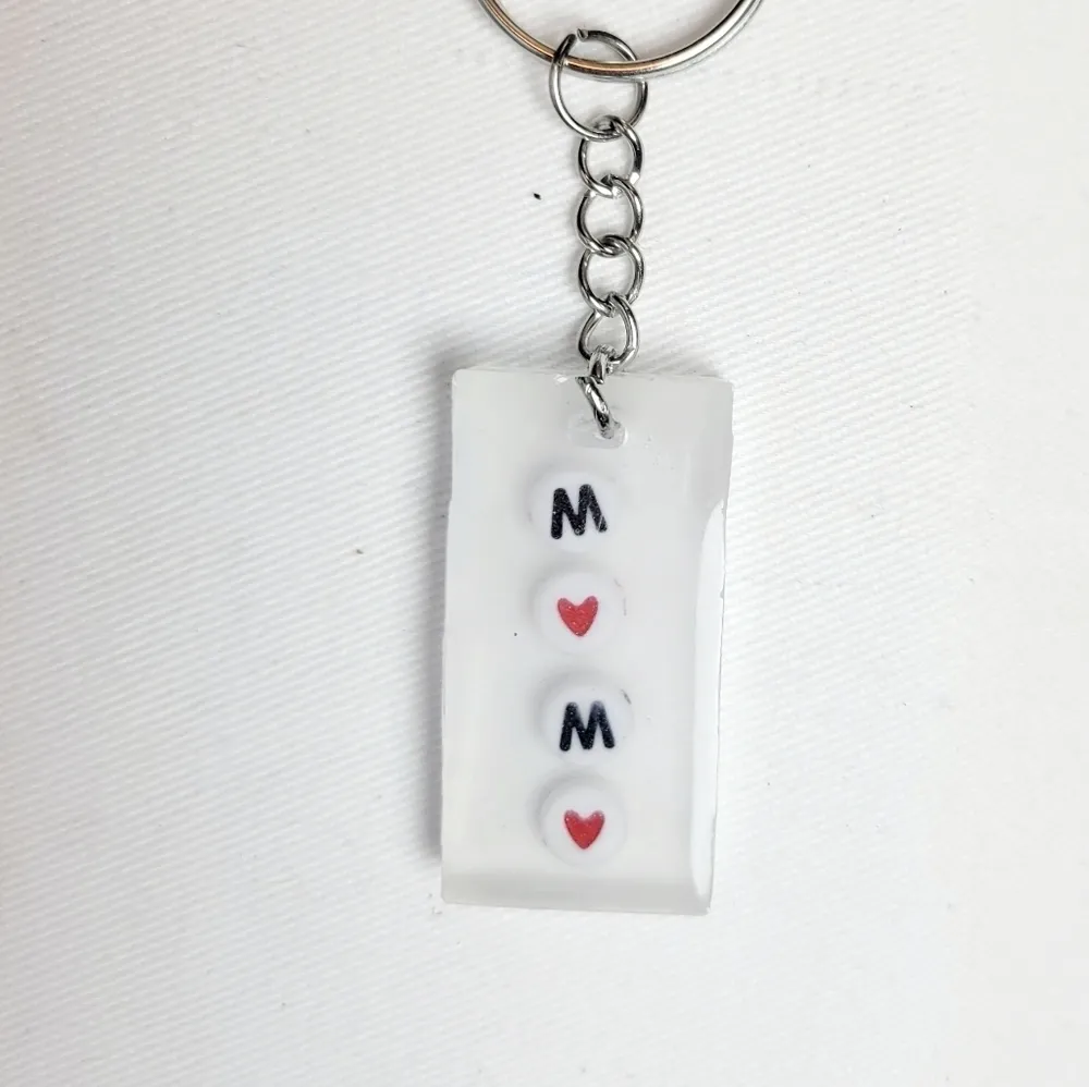 5/$25 Handmade resin epoxy glow in the dark mama keychain Blue - Image 2