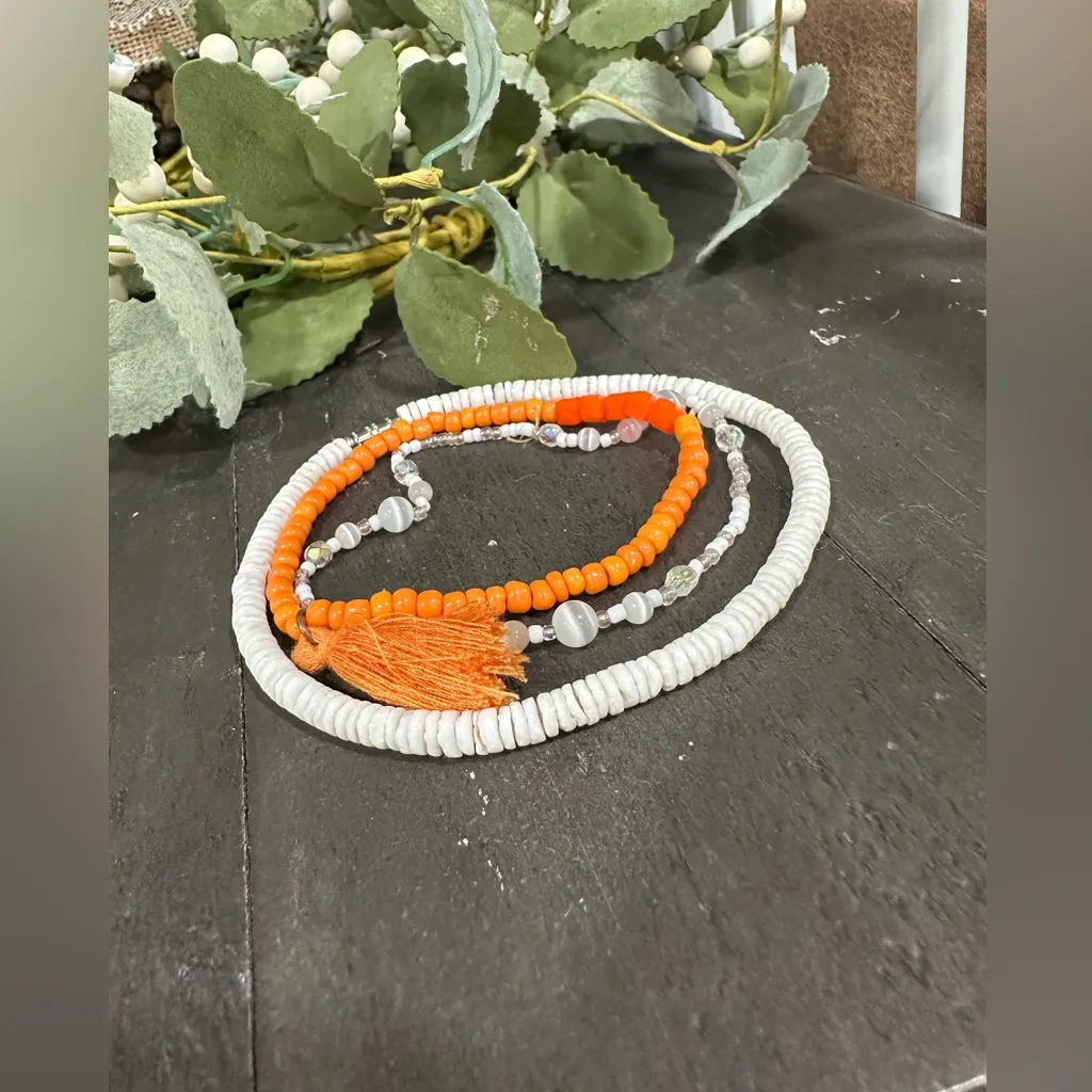 Vibrant Orange and White Beaded Bracelet Set - Image 4