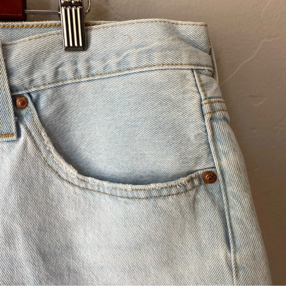 Levi's 501 Original Fit High Rise Cutoff Raw Hem Light Wash Shorts in Ojai Lake - Image 9