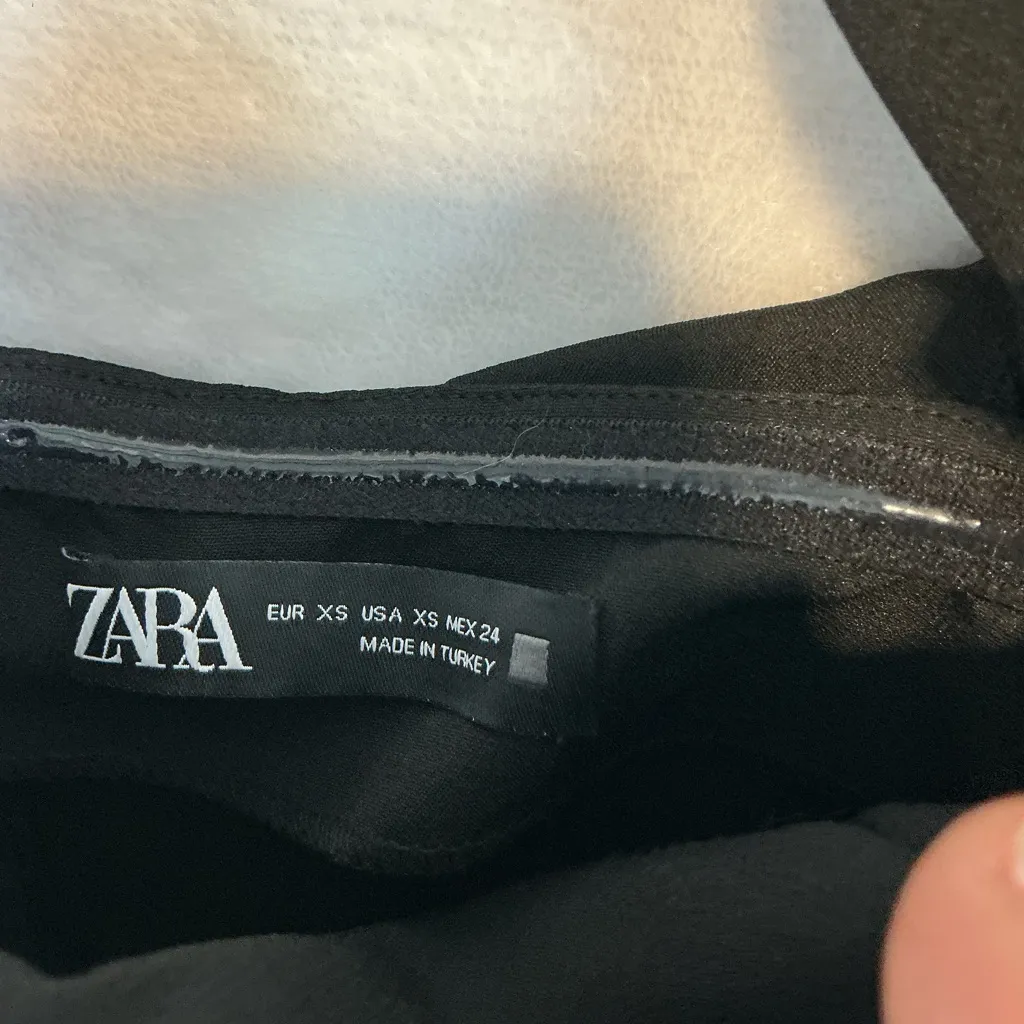 Elegant Black Dress with Statement Sleeves - Image 4