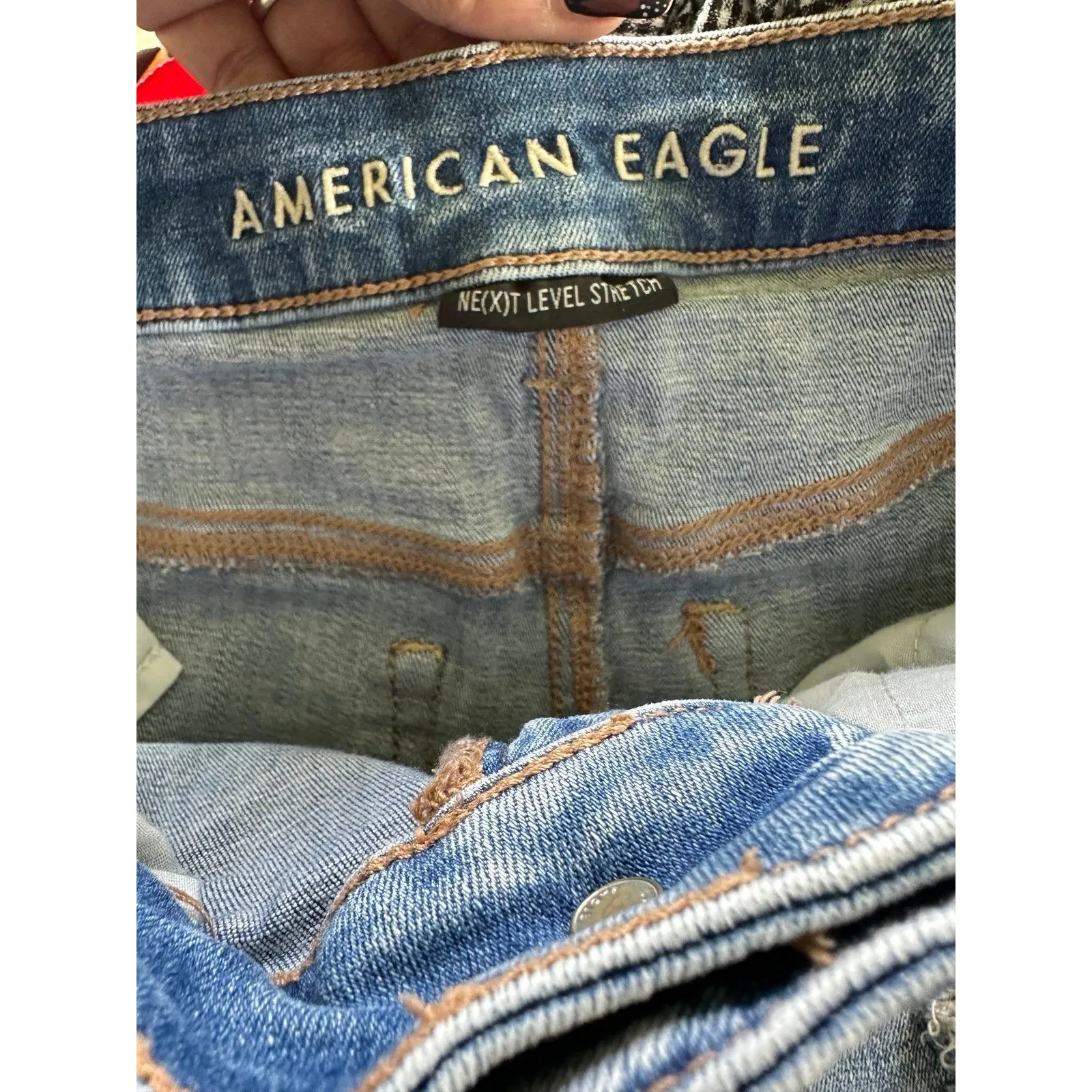 American Eagle Stretch Hi-Rise Light Wash Distressed Raw Edge Folded Hem Shortie - Image 4