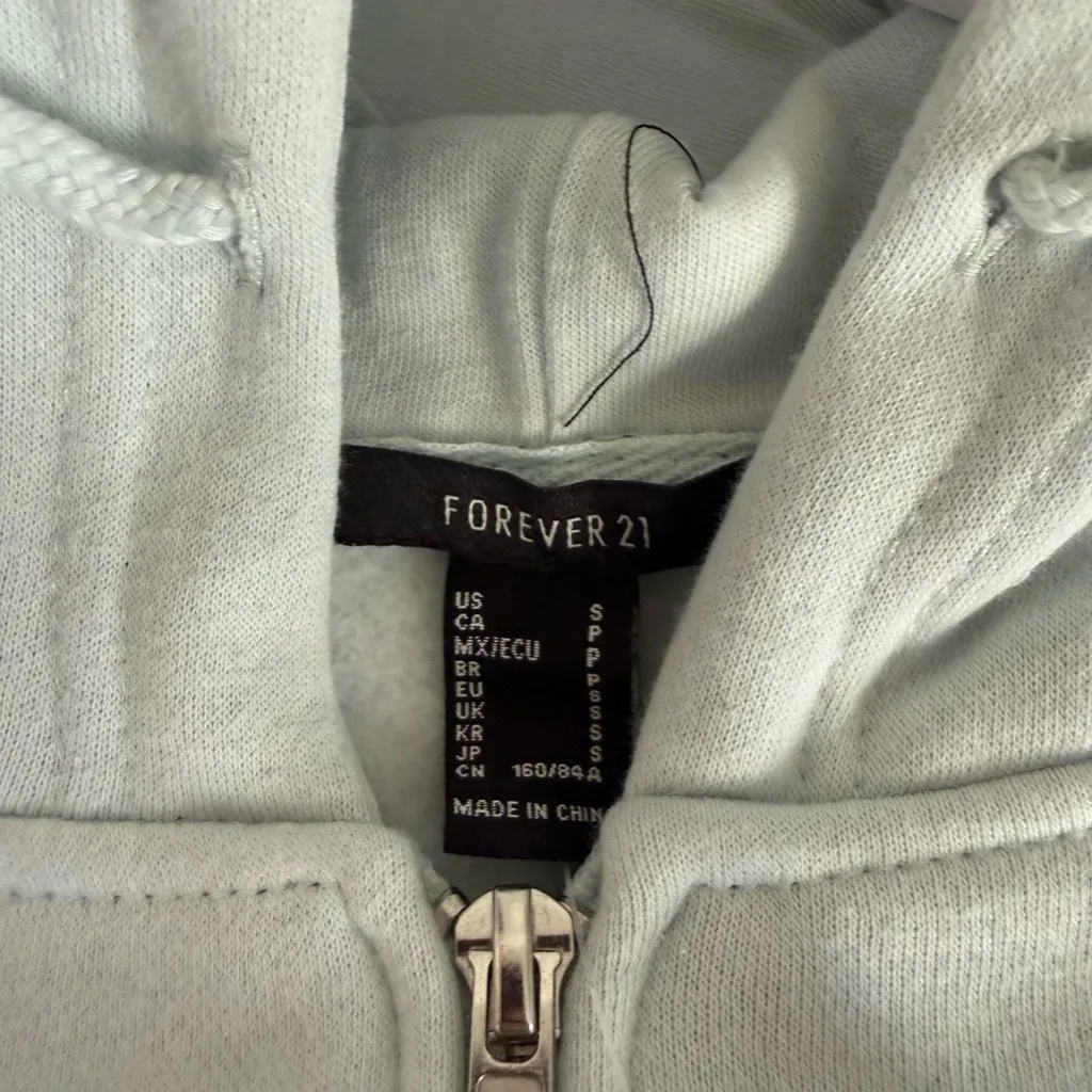 Baby blue Forever 21 cropped zip up hoodie. Size small. - Image 3