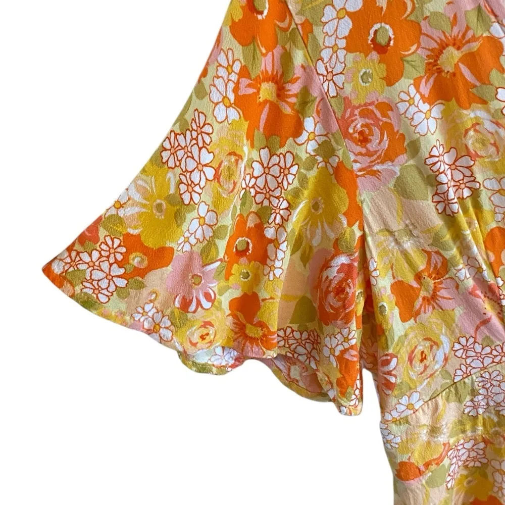 Rewind Button Front Flutter Sleeve Skater Dress
orange yellow florals Fairy core - Image 6