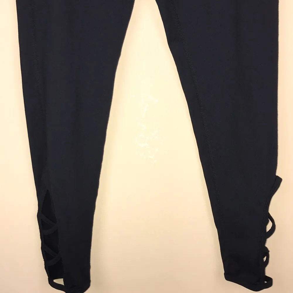 Alphalete Women’s Athletic Spell Out Waistband Criss Cross Cutout Black Leggings - Image 3