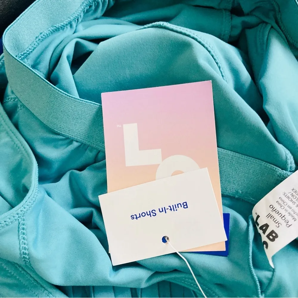 Joy Lab athletic tennis inspired dress in teal color with pleated skirt & shorts - Image 4