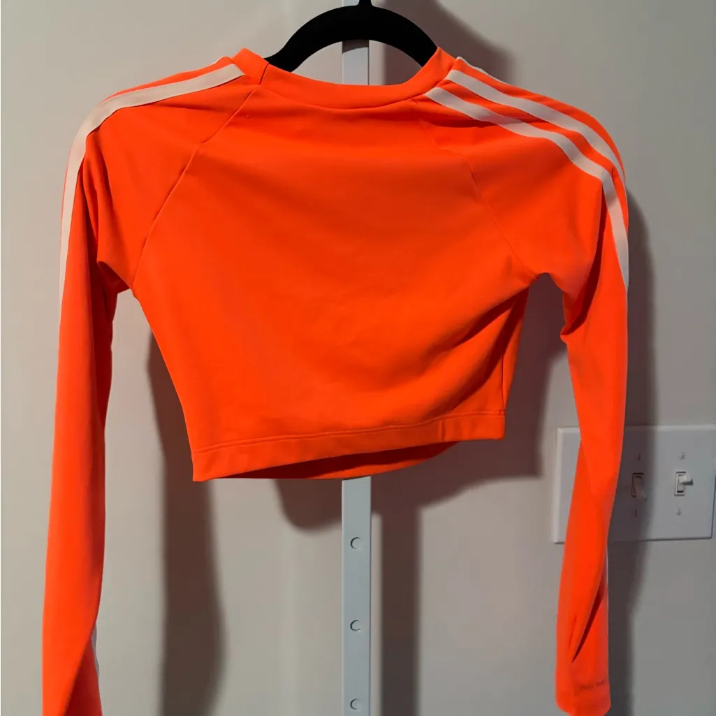 Adidas IVY PARK neon orange cropped rash guard top. - Image 3