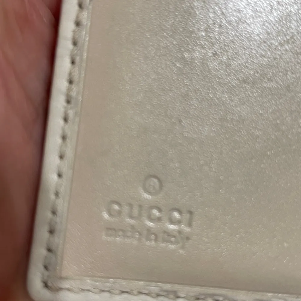 Gucci  Embossed  Leather Compact Wallet - Image 12