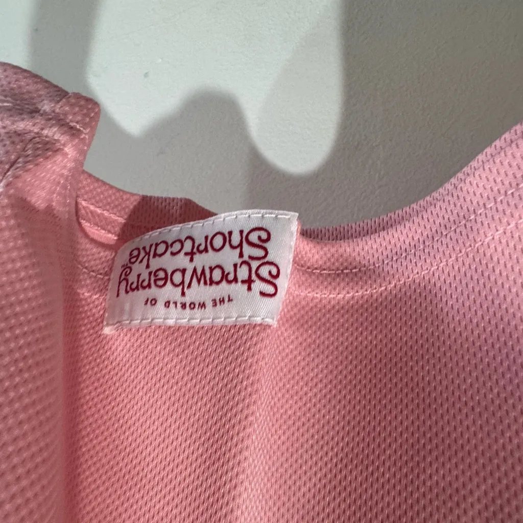 Strawberry Shortcake and Custard Cat Women's Cropped Pink Football Jersey - Image 8