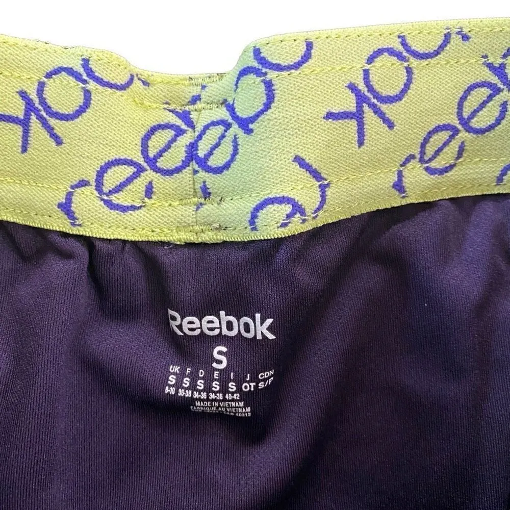 Reebok play dry small shorts purple yellow - Image 4