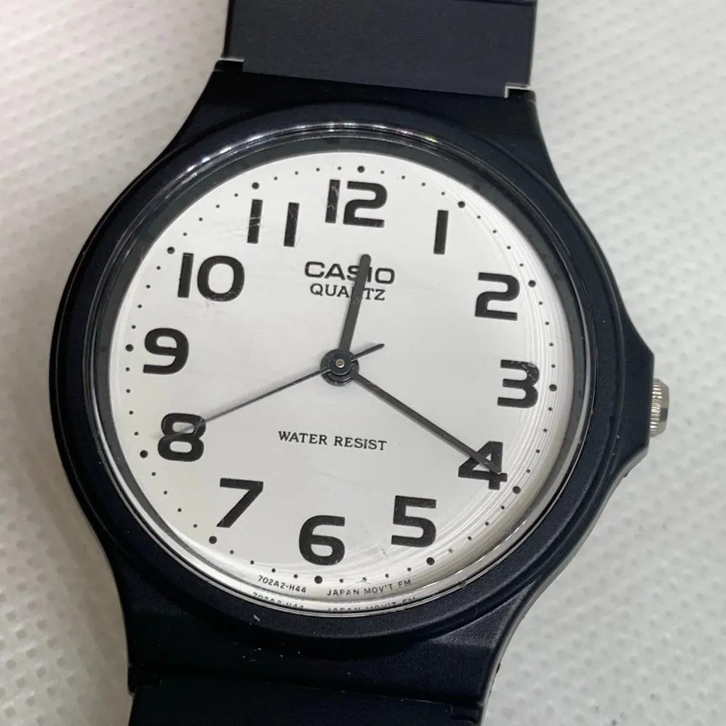 Casio MQ24 quartz analog watch 34mm round case white dial black plastic running - Image 3