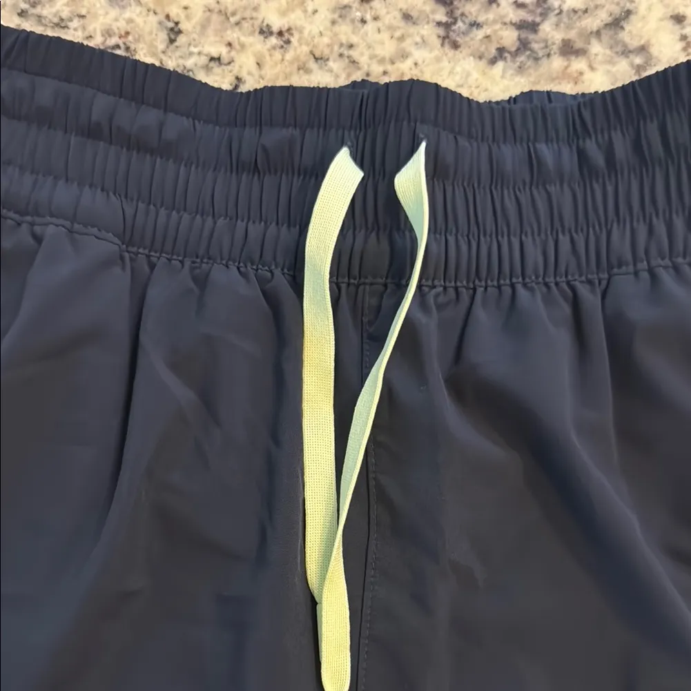 Navy Women's Shorts with Light Green Trim - Image 3