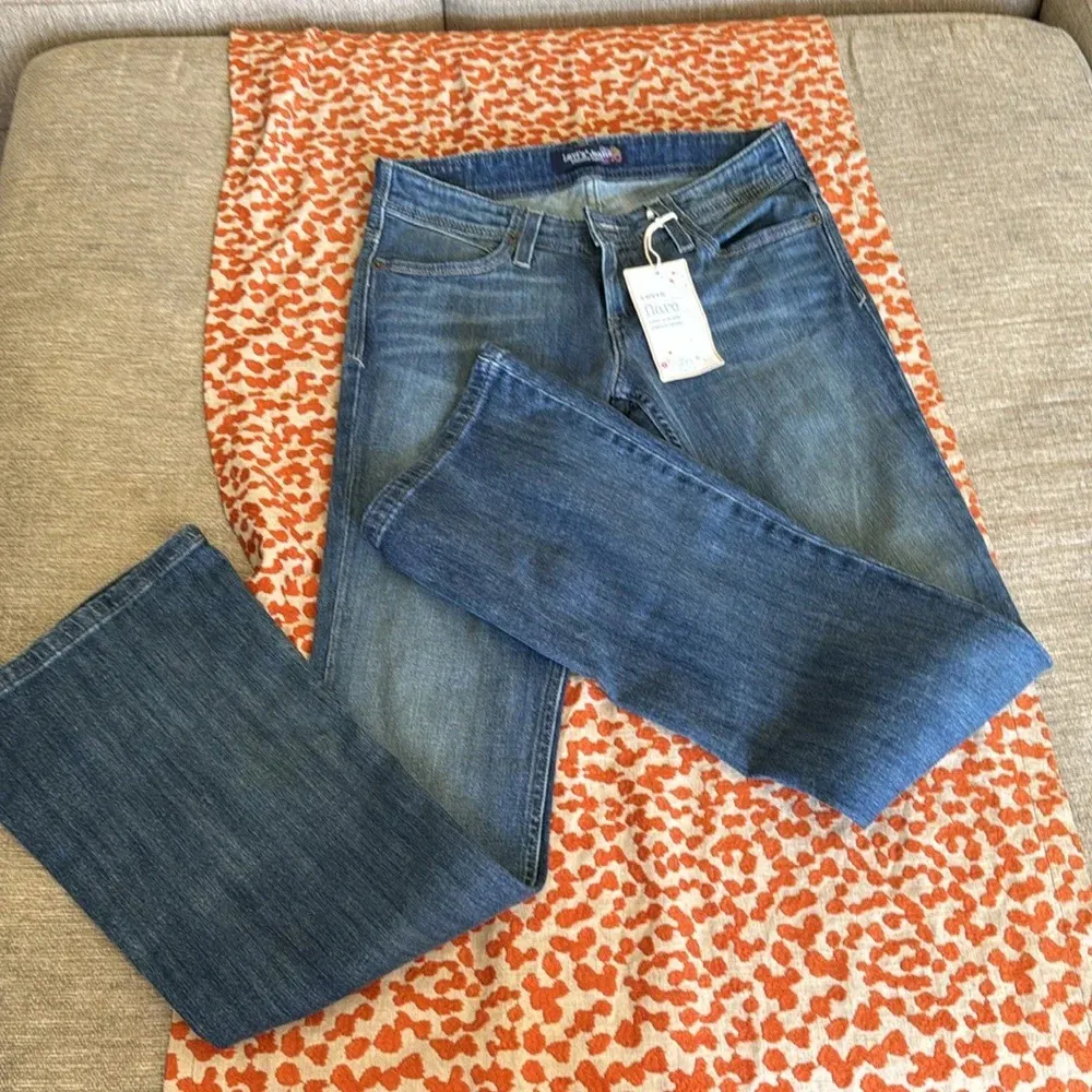 Levi’s flare ultra low rose stretch floral pocket size 5 M NWT rare find - Image 2