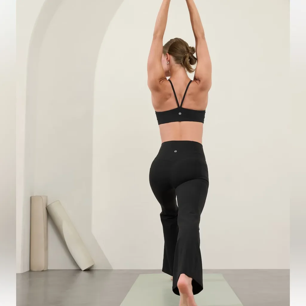 Athleta Salutation Stash pocket black Flare leggings size XS - Image 2
