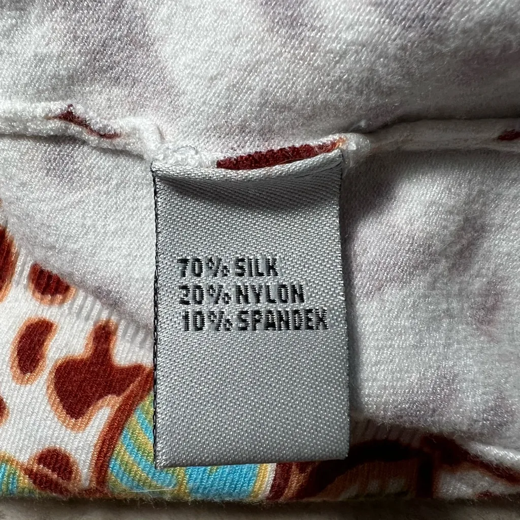 Vertigo Paris White Sweater with Orange and Brown Accents - Image 10