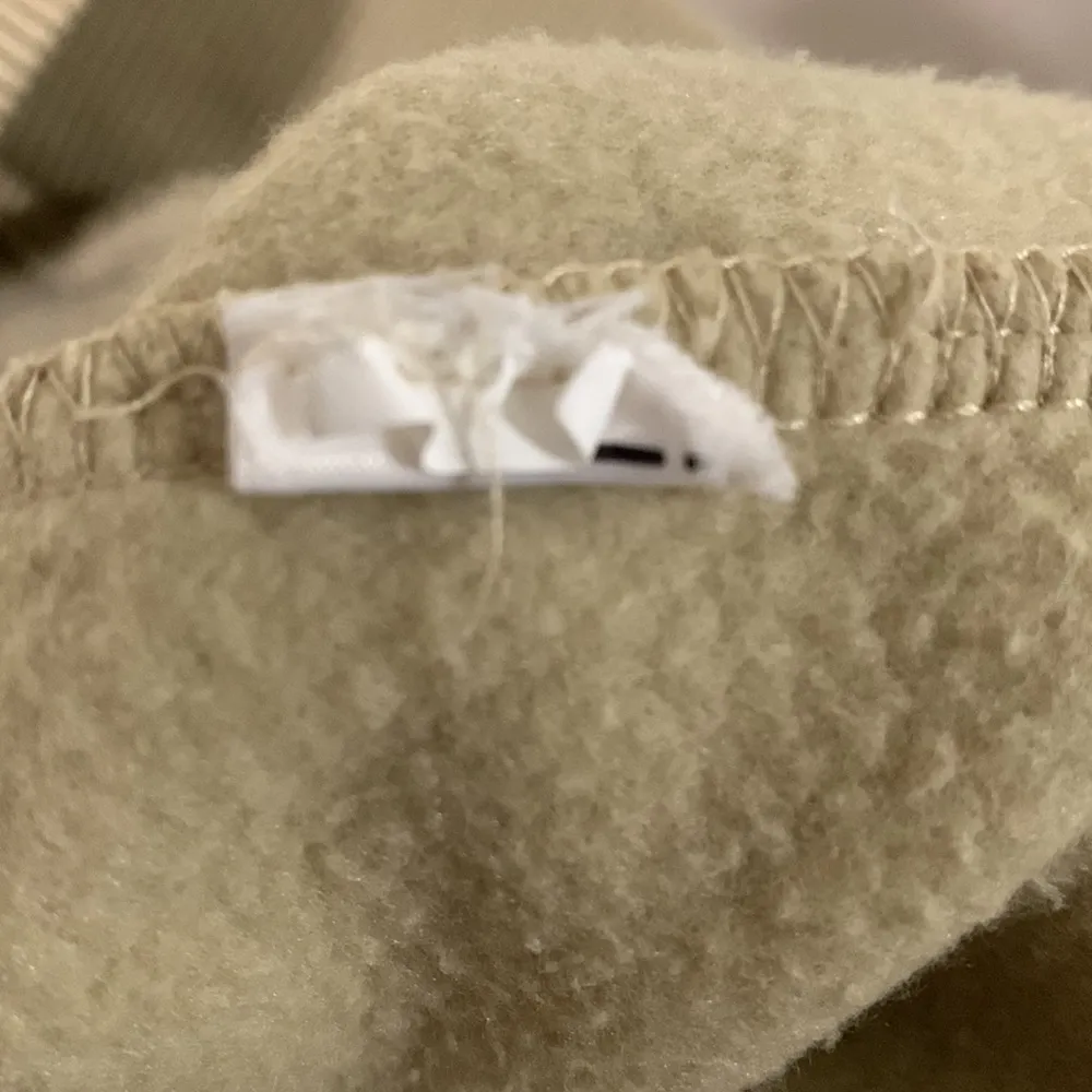 The North Face women XS hooded sweater tan color with reflective lines - Image 11