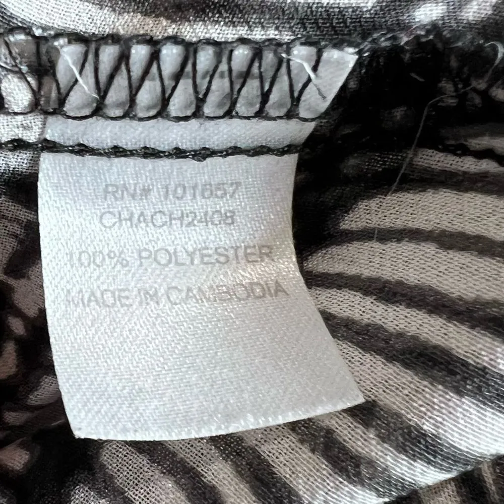 Black and white long sleeve abstract print backless peplum top size small - Image 6