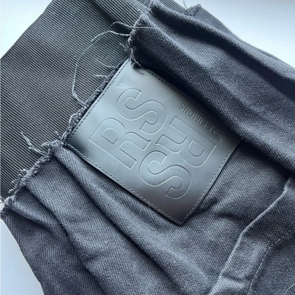 RAF SIMONS • Solid Black Cotton Wide Leg Denim Elastic Waist Pants Jeans Size L - Image 12