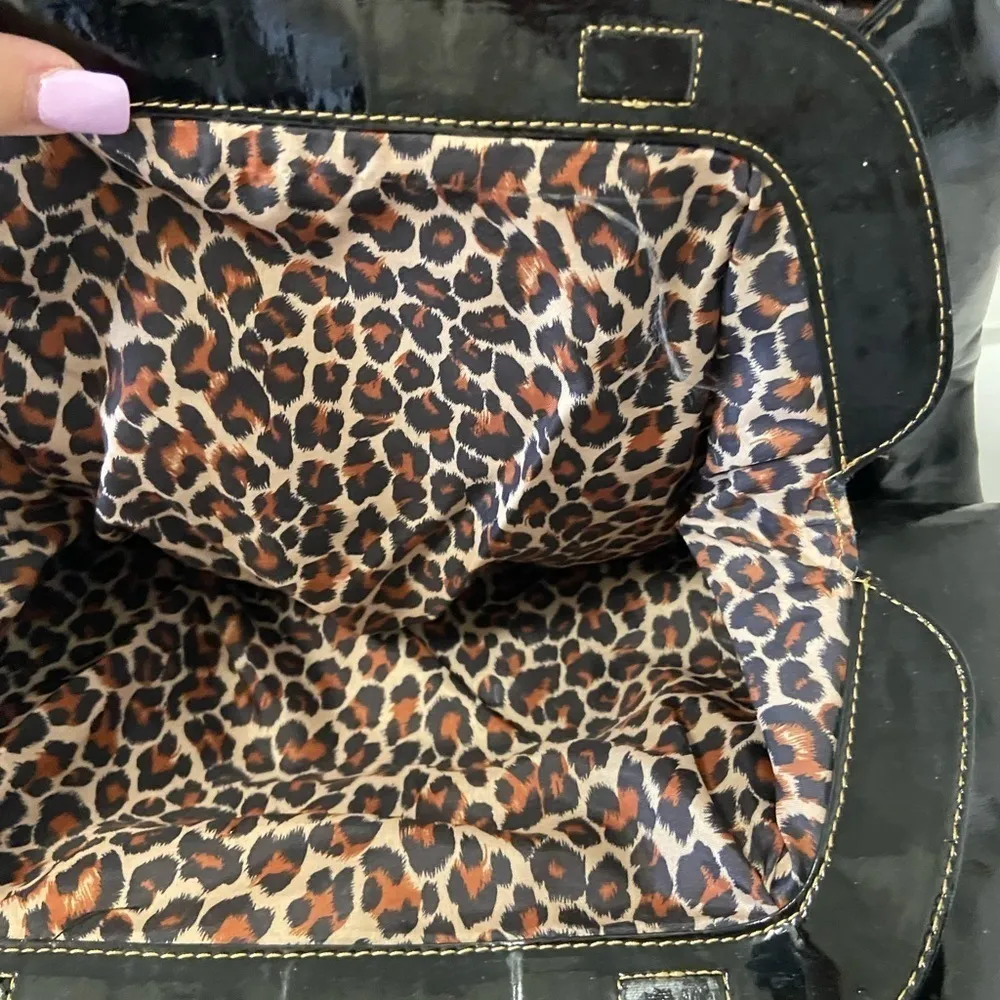 Maxx New York black patent quilted purse w gold chains on handles cheetah lining - Image 6