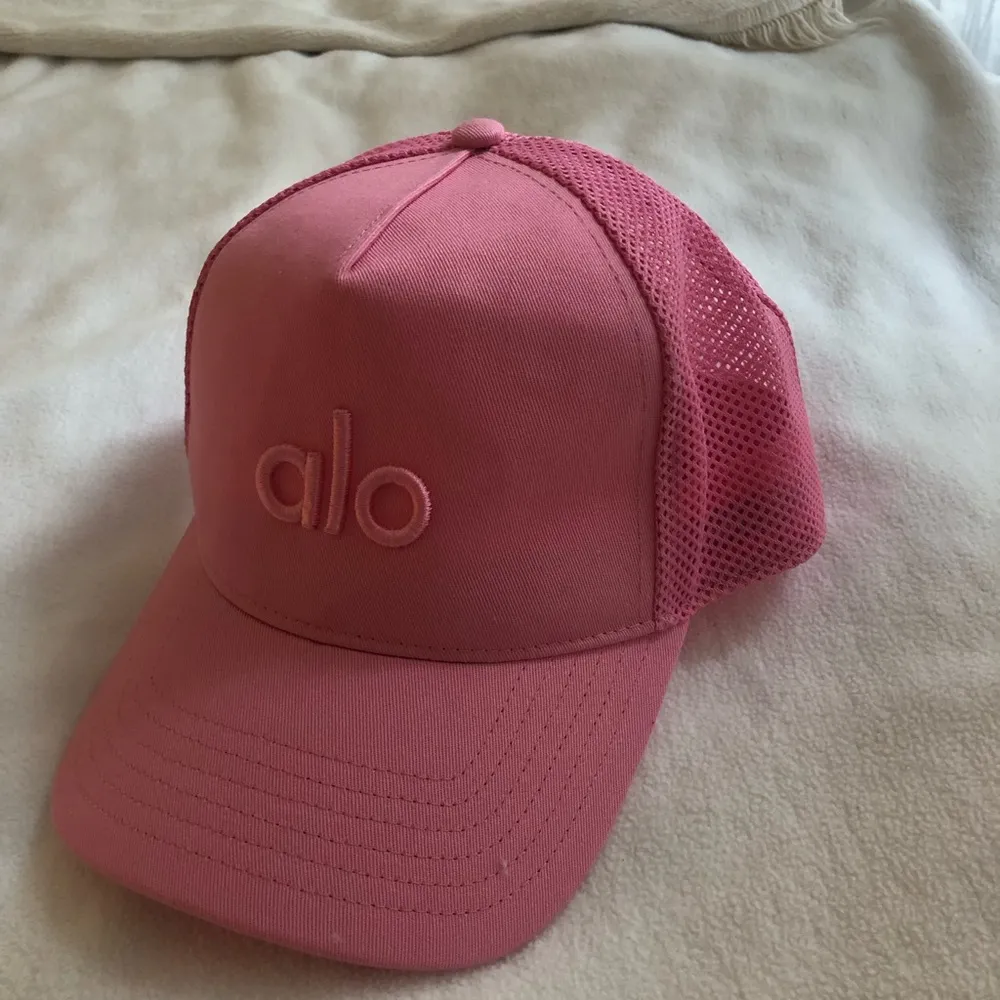 Alo Yoga Pink alo District trucker hat - $39 - From R