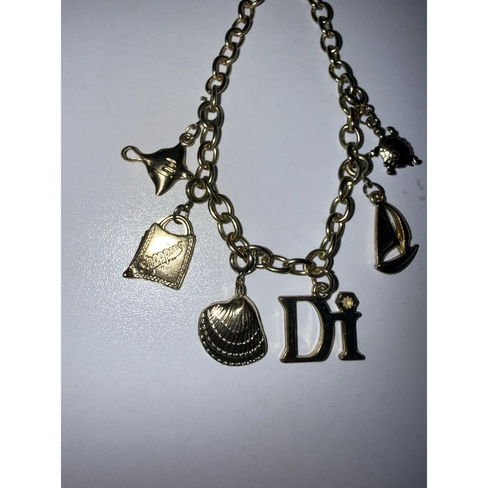 DI Diamond International Charm Bracelet 6 Charms Gold Tone Shopping Turtle Boat - Image 3