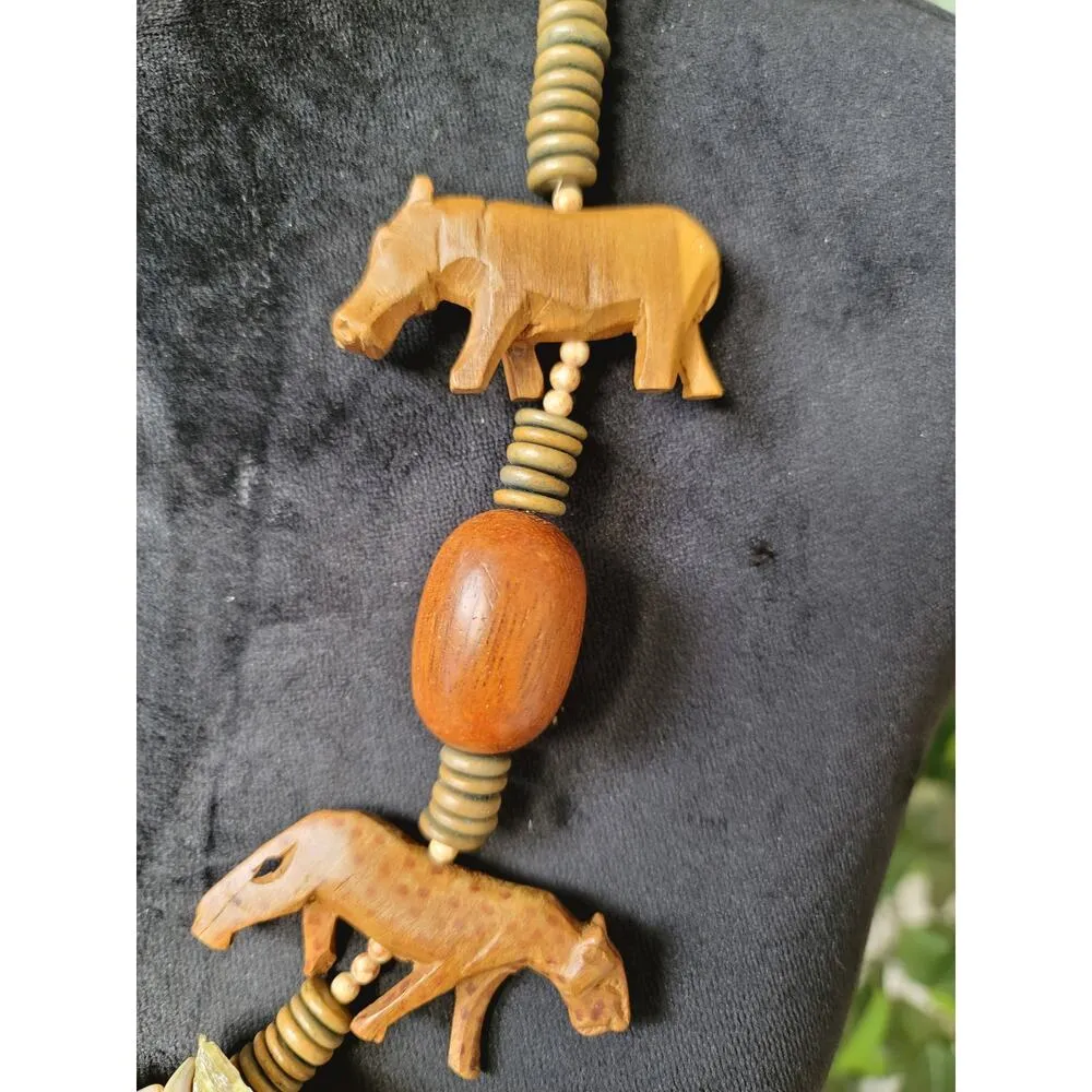 Women's Animal Carved Wood Beaded Necklace with Rhino, Lion, Bear Pendants Gold - Image 3