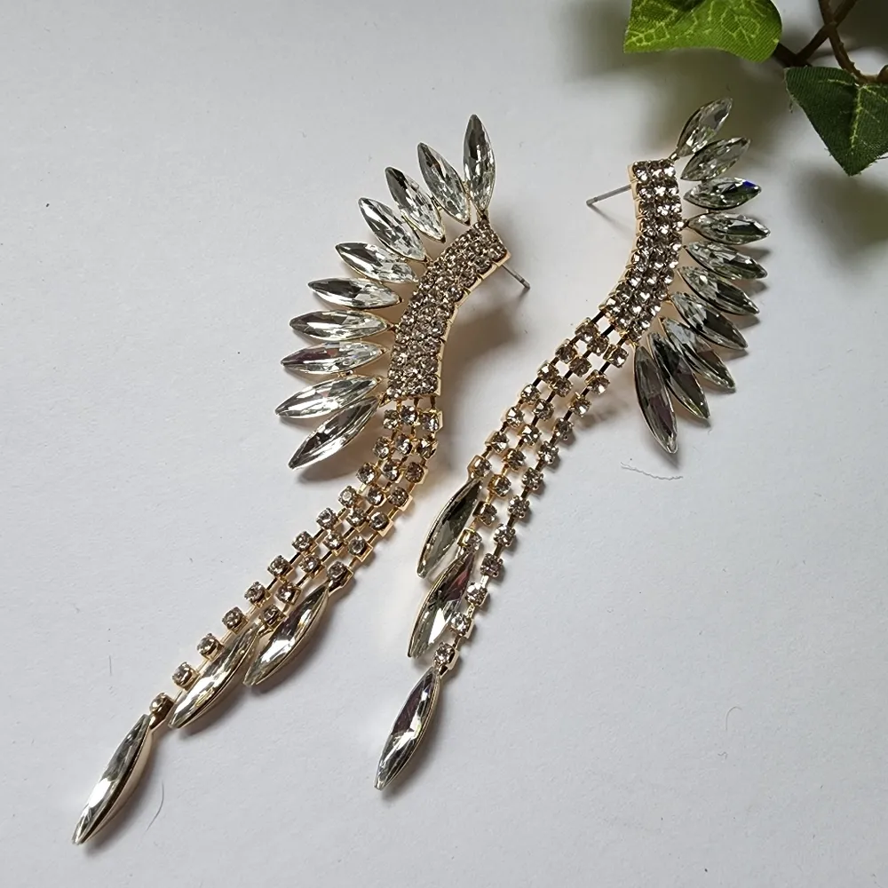Gold and Crystal Wing Fan Tassel Dangle Earrings - Image 2