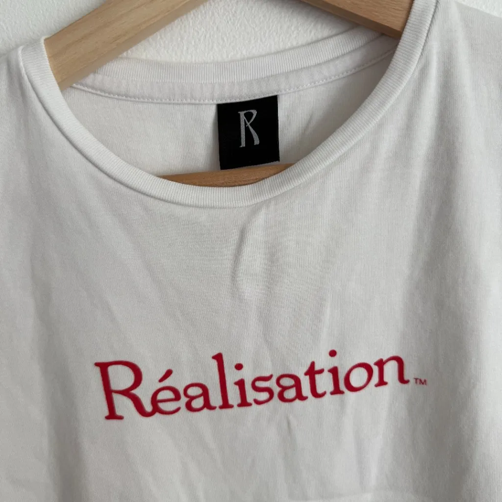 Realisation Par Réal Logo Baby Tee in White - Image 7